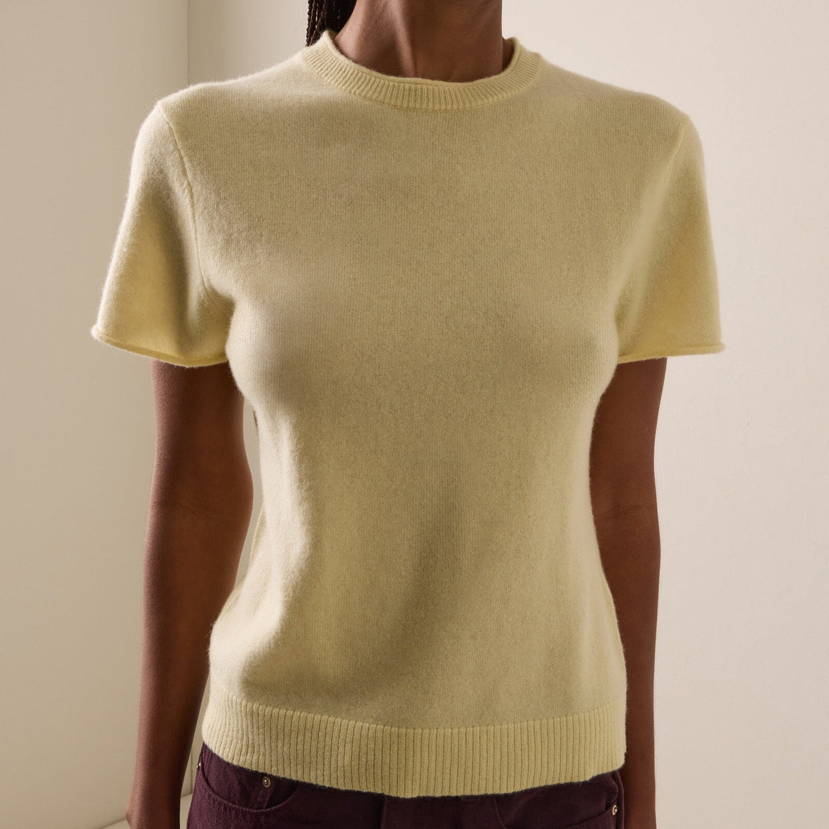 Pale yellow crew neck knit top