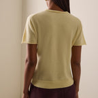 Pale yellow crew neck knit top