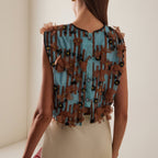 Sleeveless top with blue striped appliqués